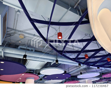 Ceiling with ventilation pipes and lights in industrial building Ceiling with ventilation pipes and lights in industrial building 117238467