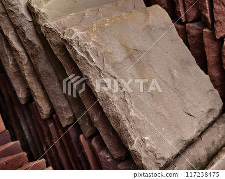 A collection of concrete tile is arranged on one another 117238475