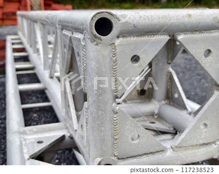 Metal parts of the stage are stacked on top of each other 117238523