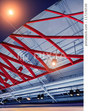 Ceiling with ventilation pipes and lights in industrial building Ceiling with ventilation pipes and lights in industrial building 117238530