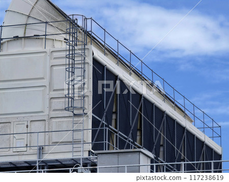 Ventilation pipes on the top of large industrial building 117238619