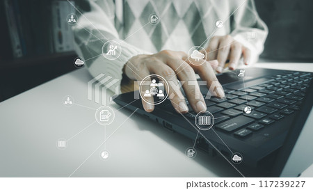 Internet connection concepts and database management, woman is typing keyboard on laptop, cloud computing, big data, Internet of things, online shopping and cashless society Internet connection concepts and database management, woman is typing keyboard on laptop, cloud computing, big data, Internet of things, online shopping and cashless society 117239227