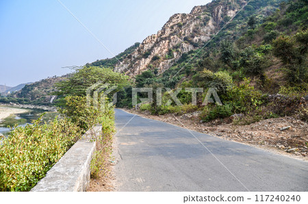Village road through a rocky terrain Village road through a rocky terrain 117240240