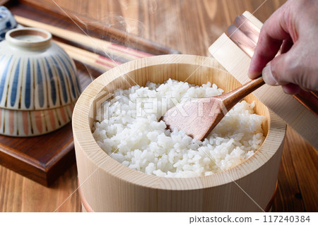 Freshly cooked rice in a rice cooker 117240384