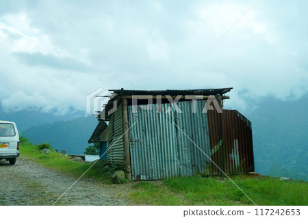 Hut Beside the Narrow road of Mountain at East Sikkim Hut Beside the Narrow road of Mountain at East Sikkim 117242653