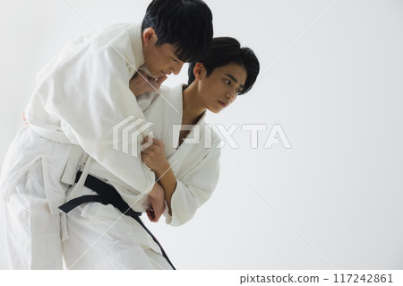 Man in judo uniform 117242861