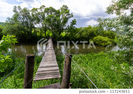 Suspension bridge, walkway to the adventurous, cross to the other side 117243651