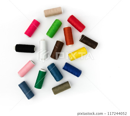 pile of sewing colored threads isolated on white 117244052