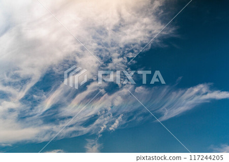 Thin clouds spreading across the blue sky 117244205