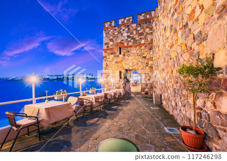 Sozopol, Bulgaria. Summertime travel landscape with ancient walls of Apollonia and Black Sea rocky coastline. 117246298
