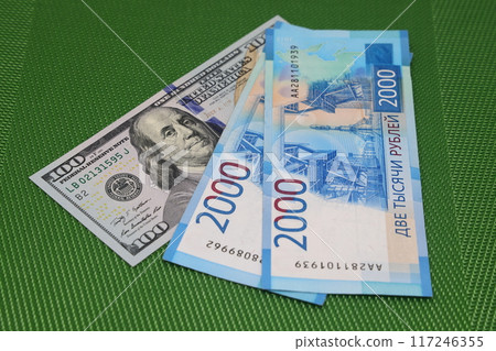 Currency euro and dollars. Money and finance. Euro banknotes on a green background. 117246355