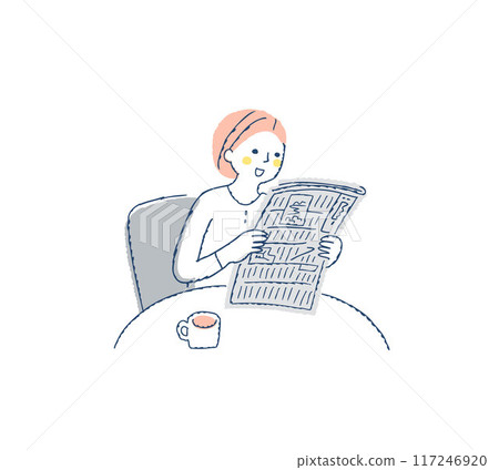 Smiling woman sitting at a table and reading a newspaper 117246920