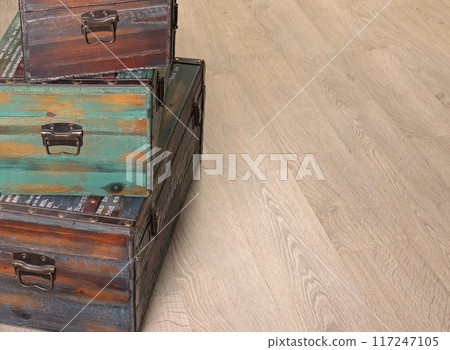 Colorful wooden chests on floor. Background for design. Traditions and storage of things in house.  117247105
