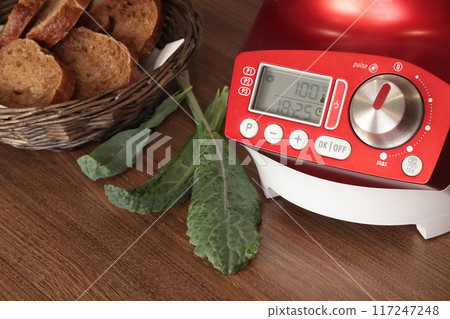 Electric soup maker for making pureed vegetable soup. Useful cream soup and healthy eating. Cooking at home in kitchen. Home smart equipment. Electric soup maker for making pureed vegetable soup. Useful cream soup and healthy eating. Cooking at home in kitchen. Home smart equipment. 117247248