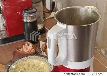 Electric soup maker for making pureed vegetable soup. Useful cream soup and healthy eating. Cooking at home in kitchen. Home smart equipment. Electric soup maker for making pureed vegetable soup. Useful cream soup and healthy eating. Cooking at home in kitchen. Home smart equipment. 117247250
