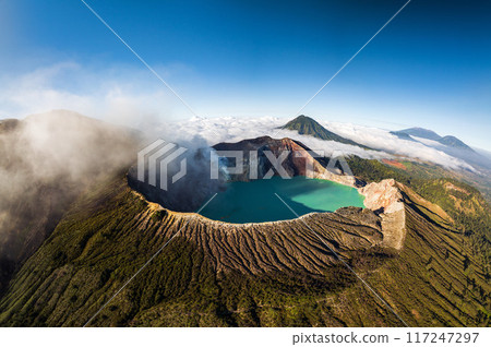 Aerial panorama drone view of mount Kawah Ijen volcano crater at sunrise, East Java, Indonesia Aerial panorama drone view of mount Kawah Ijen volcano crater at sunrise, East Java, Indonesia 117247297