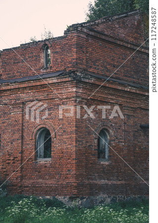 A corner of a ruined brick stable building. 19th century buildings A corner of a ruined brick stable building. 19th century buildings 117248587