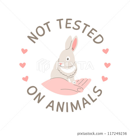 Cruelty free doodle hand drawn icon. Not tested on animals logo sticker for animal friendly product packaging. Cute cartoon rabbit on hand with text. Vegan eco cosmetics. Simple colorful round badge 117249236