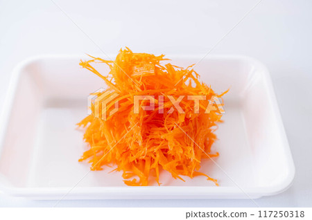 Carrots, sliced into strips Carrots, sliced into strips 117250318