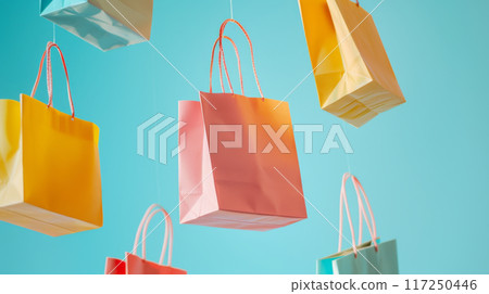 Colorful Shopping Bags Hanging on Blue Background 117250446