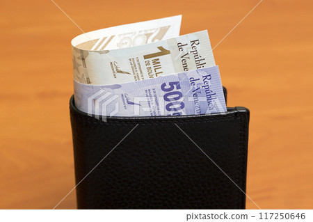 Venezuelan bolivar in the black wallet 117250646