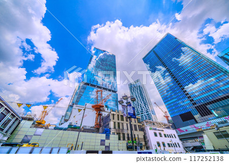 Tokyo cityscape in Japan: Goodbye Shibuya Station West Exit... Demolition progresses and the left side of the building disappears... Blue sky becomes visible = August 9th Tokyo cityscape in Japan: Goodbye Shibuya Station West Exit... Demolition progresses and the left side of the building disappears... Blue sky becomes visible = August 9th 117252138