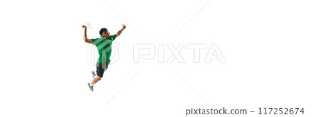 Dynamic image of focused, skillful badminton player, main min motion hitting shuttlecock in jump isolated on white background Dynamic image of focused, skillful badminton player, main min motion hitting shuttlecock in jump isolated on white background 117252674