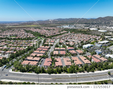 Aerial view of identical condominium houses in Lake Forest, California 117253017