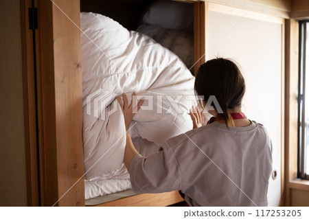 Futon and closet 117253205