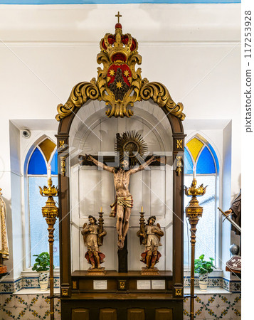 The golden interior of the Carmelite church Igreja do Carmo at Faro in Portugal The golden interior of the Carmelite church Igreja do Carmo at Faro in Portugal 117253928