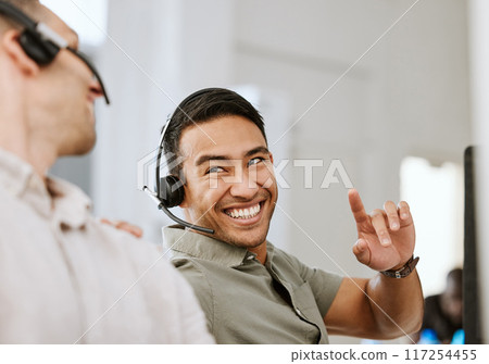 Happy, smiling and laughing call center agent at an insurance company talking to colleague at a help desk. Contact us and our sales customer service support centre and learn about us and thank you Happy, smiling and laughing call center agent at an insurance company talking to colleague at a help desk. Contact us and our sales customer service support centre and learn about us and thank you 117254455