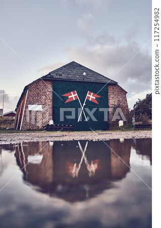 Iconic old boat hut at danish coast Iconic old boat hut at danish coast 117254982