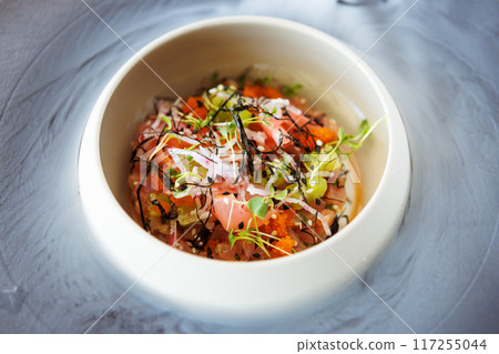 Tuna tartare. Ponzu sauce, chives, cucumber, masago and nori. Delicious healthy Italian traditional food closeup served for lunch in modern gourmet cuisine restaurant 117255044