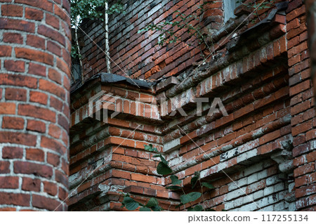Red Brick wall of the stable, built in the 19th century 117255134