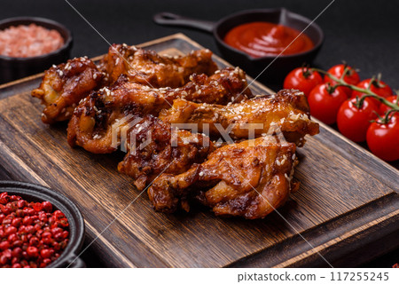 Delicious crispy baked chicken wings in teriyaki sauce Delicious crispy baked chicken wings in teriyaki sauce 117255245