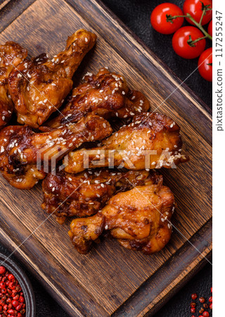 Delicious crispy baked chicken wings in teriyaki sauce Delicious crispy baked chicken wings in teriyaki sauce 117255247