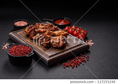 Delicious crispy baked chicken wings in teriyaki sauce Delicious crispy baked chicken wings in teriyaki sauce 117255248