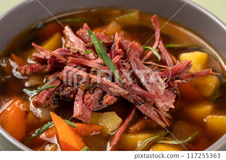 Portion of brisket rustic soup 117255363