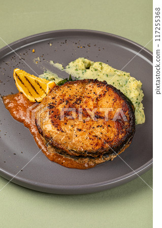 Portion of gourmet grilled salmon steak Portion of gourmet grilled salmon steak 117255368