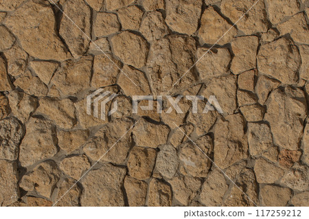 Brown rough stone texture pattern abstract solid wall background rock grunge hard Brown rough stone texture pattern abstract solid wall background rock grunge hard 117259212