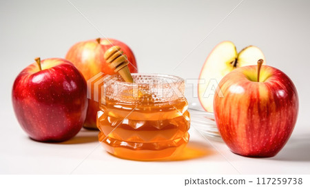 Fresh Apples and honey Arranged Beautifully on White Background for the celebration of Jewish New Year Rosh Hashanah Fresh Apples and honey Arranged Beautifully on White Background for the celebration of Jewish New Year Rosh Hashanah 117259738