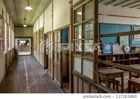 A retro hallway lit by bare light bulbs [Abandoned elementary school] 117261860