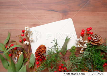 Red Christmas wreath and Christmas tree, New Year festive decoration Red Christmas wreath and Christmas tree, New Year festive decoration 117262590