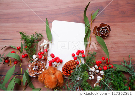 Red Christmas wreath and Christmas tree, New Year festive decoration Red Christmas wreath and Christmas tree, New Year festive decoration 117262591