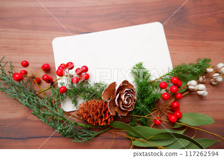 Red Christmas wreath and Christmas tree, New Year festive decoration Red Christmas wreath and Christmas tree, New Year festive decoration 117262594