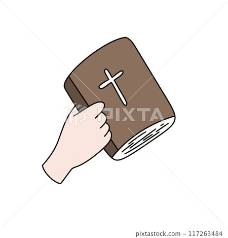 A hand holding a brown book with a cross on it A hand holding a brown book with a cross on it 117263484