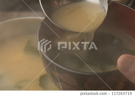 Miso soup: Tofu and wakame miso soup in a bowl Miso soup: Tofu and wakame miso soup in a bowl 117263719