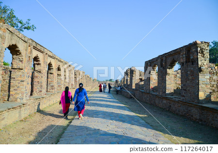 Stone wall with arches in the ruins of 16th century Bhangarh fort at Alwar, Rajasthan, India Stone wall with arches in the ruins of 16th century Bhangarh fort at Alwar, Rajasthan, India 117264017