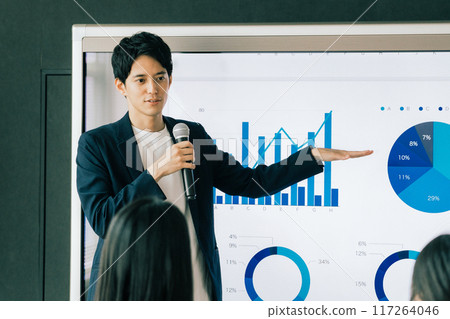 A man giving a presentation A man giving a presentation 117264046