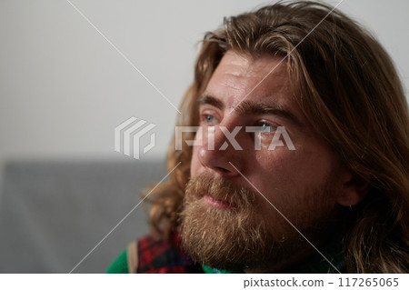 Contemplating Man With Long Hair And Beard Contemplating Man With Long Hair And Beard 117265065